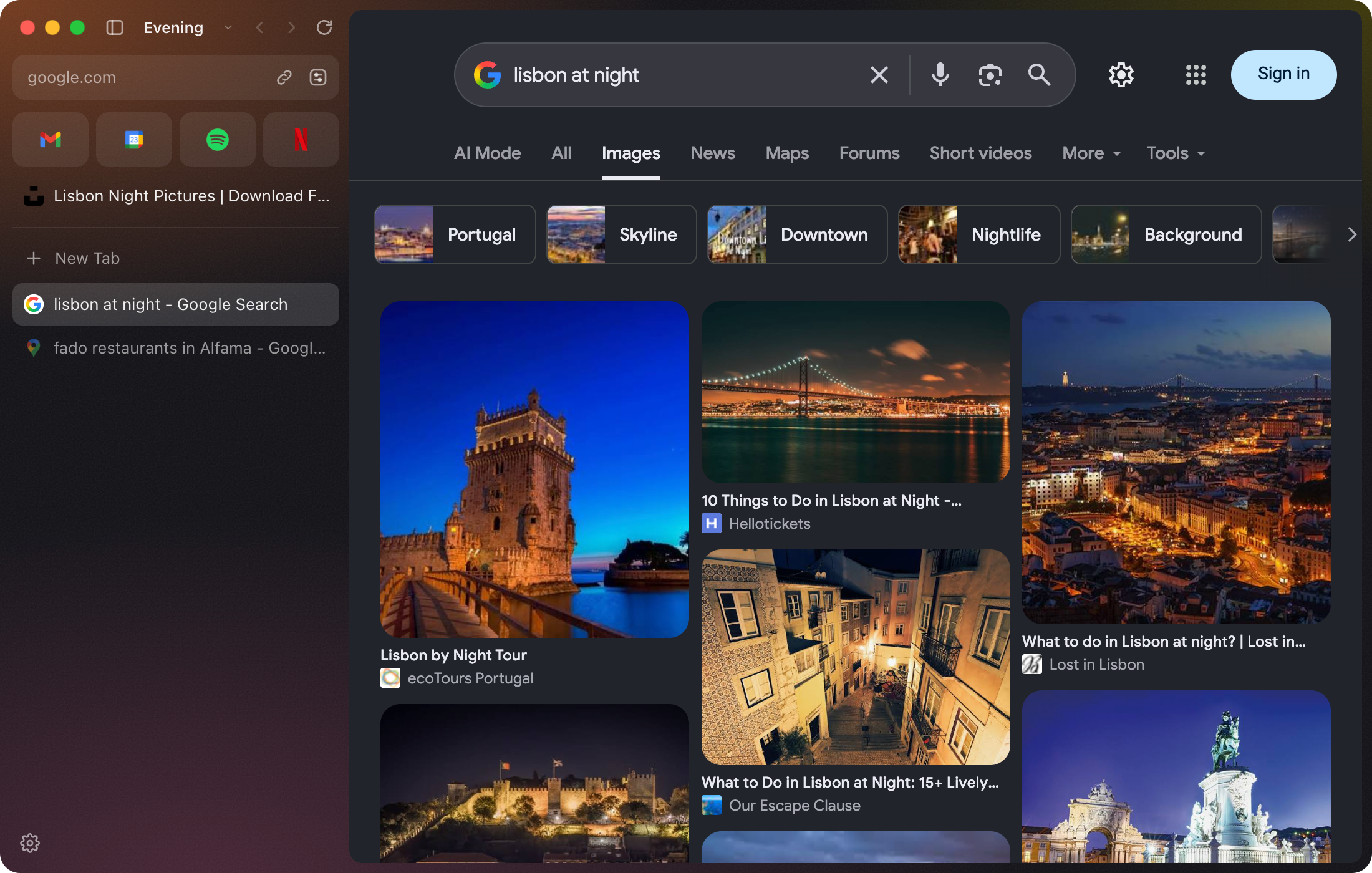 A space called Evening, in the dark Ember theme, with Google Images showing Lisbon at night, in dark mode.